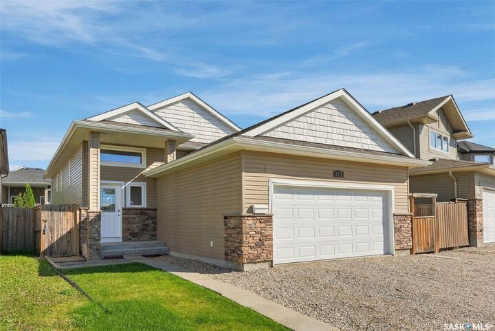 Property Photo:  1114 Hargreaves Way  SK S7R 0H2 