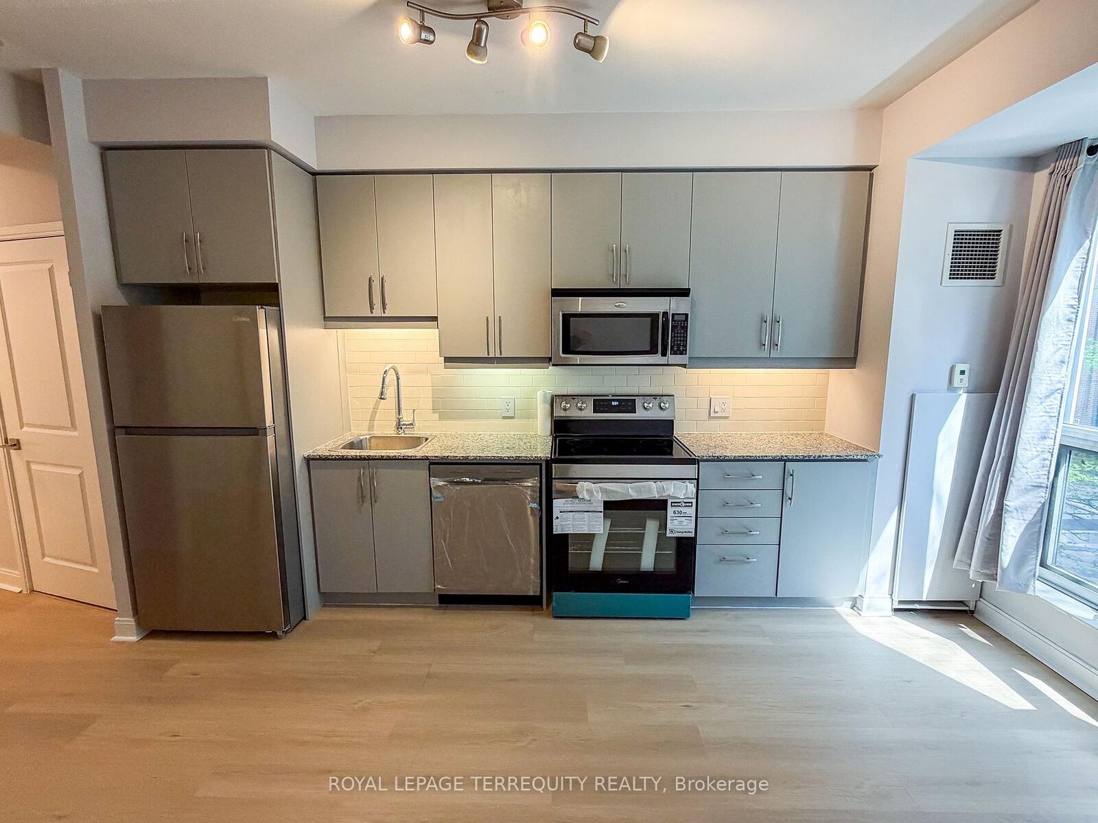 Property Photo:  1 Scott Street 311  ON M5E 1A1 