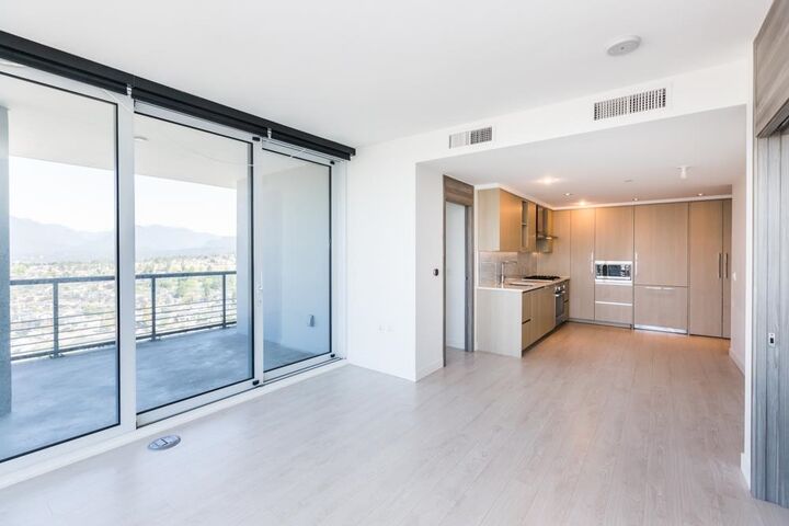 Property Photo:  4720 Lougheed Highway 3002  BC V5C 0M8 