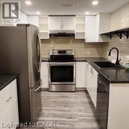 Property Photo:  53 Laird Drive Bsm  ON L8T 4L8 