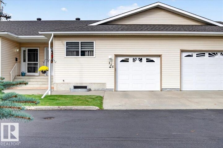 Property Photo: 4610 50 Ave 125 AB T7Z 1P4