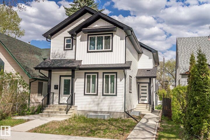 Property Photo:  12033 92 Street NW  AB T5G 1A8 
