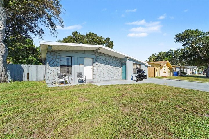 Property Photo:  4834 Alvarado Drive  FL 33634 