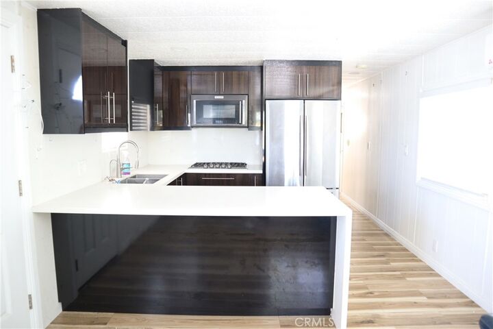 Property Photo:  15141 Beach Boulevard 63  CA 92655 