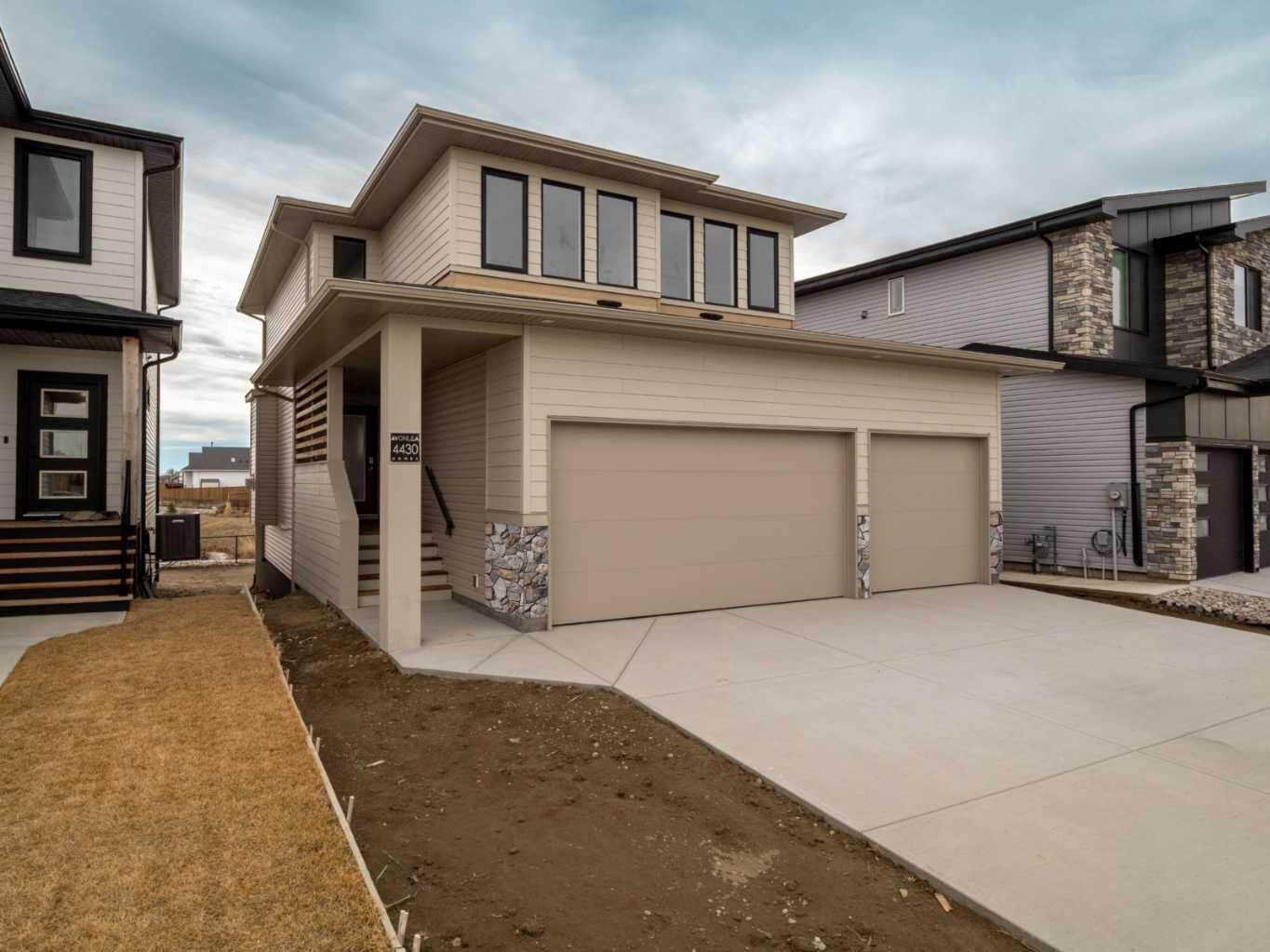 Property Photo:  421 Blackwolf Boulevard N  AB T1H 7J5 