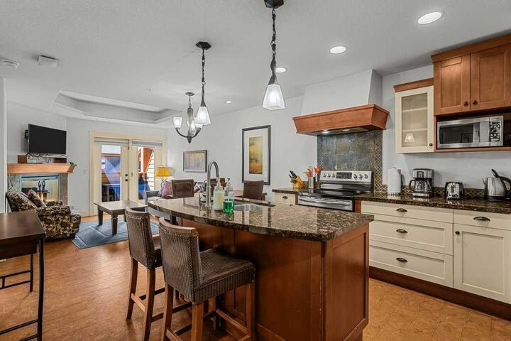 Property Photo:  173 Kananaskis Way 310ab  AB T1W 0A8 