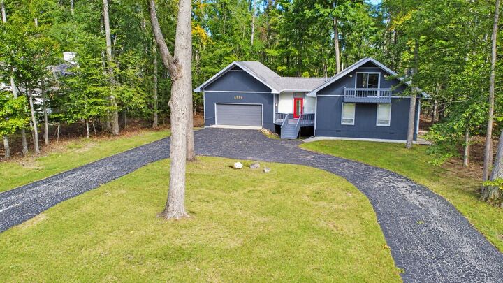 Property Photo:  6559 Forest Park Trail  MI 49735 