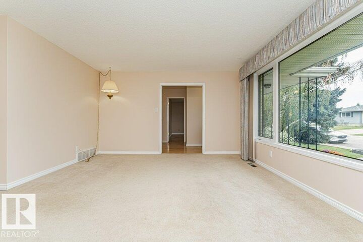 Property Photo:  3543 106A Street NW  AB T6J 1A7 