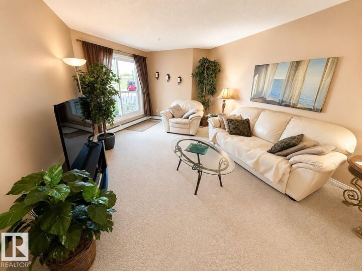 Property Photo:  9932 100 Avenue 109  AB T8L 4L2 