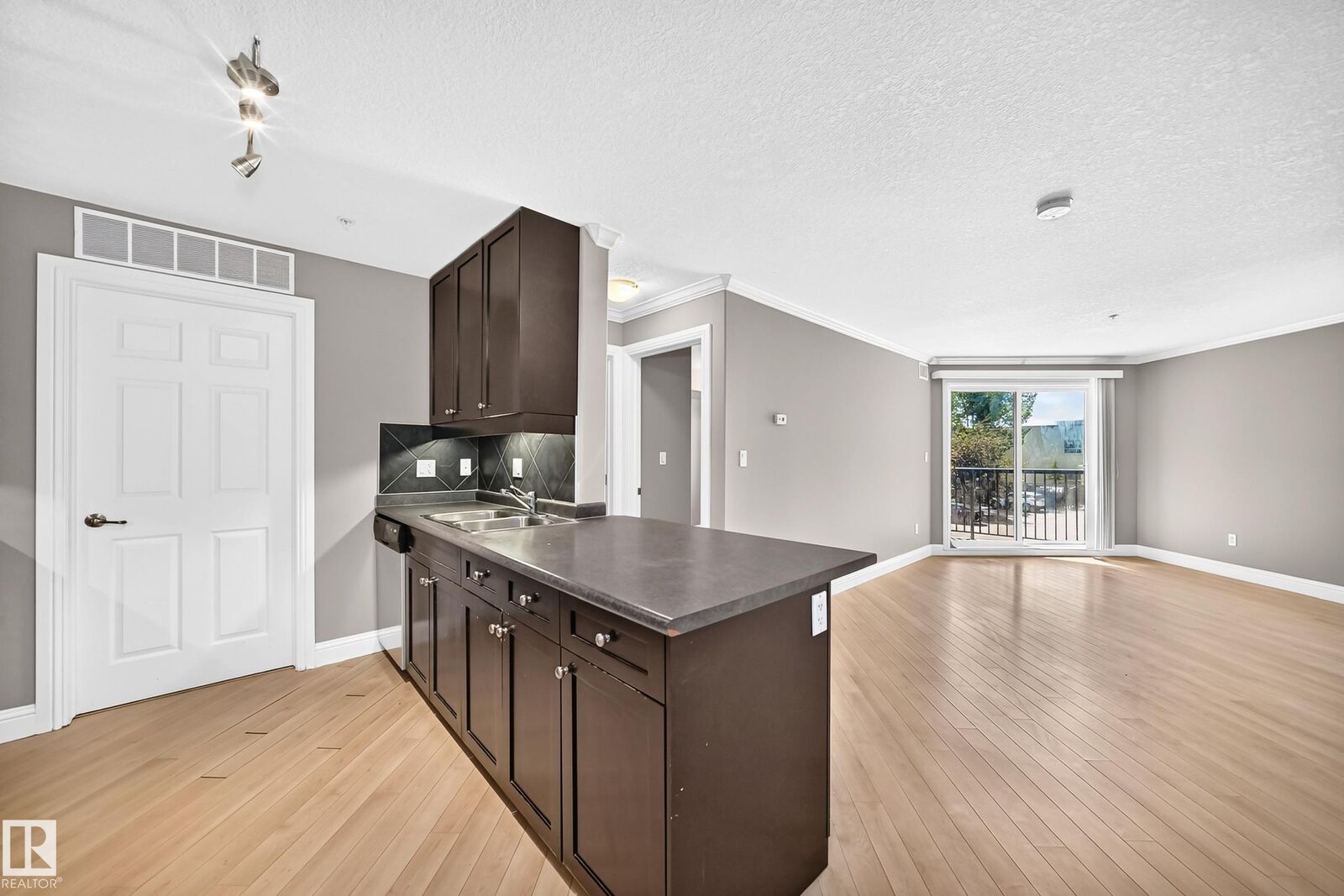 Property Photo:  14608 125 Street NW 202  AB T5X 0B5 