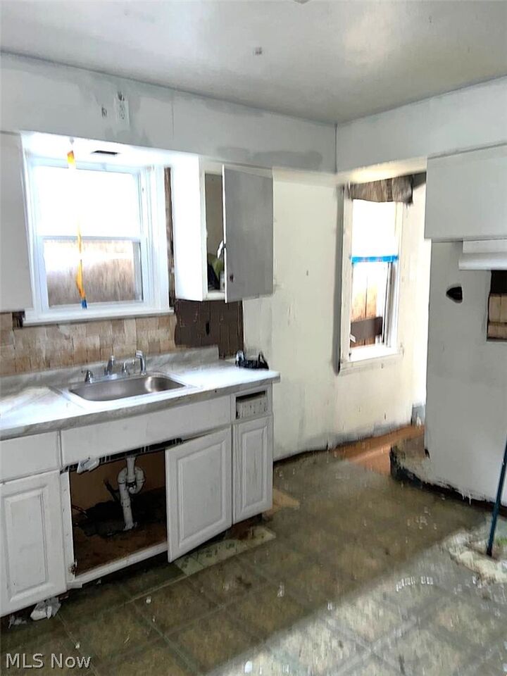 Property Photo:  7404 Wentworth Avenue  OH 44102 
