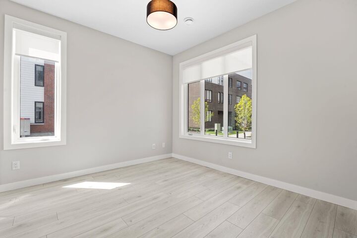 Property Photo:  8155 8 Avenue SW 203  AB T3H 6B1 