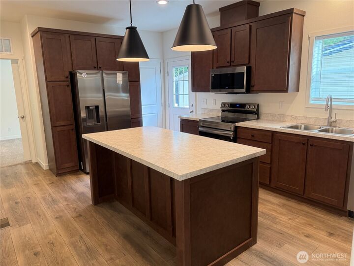 Property Photo:  375  Union Avenue SE 68  WA 98059 
