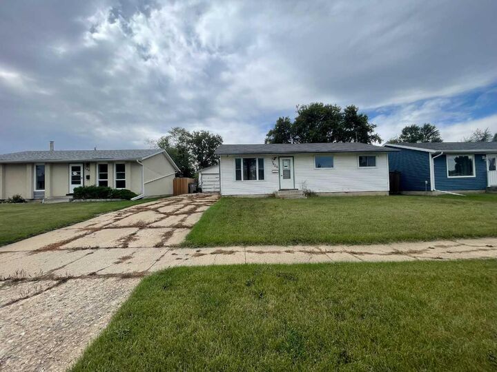 Property Photo:  3406 48 Avenue  SK S9V 1A9 
