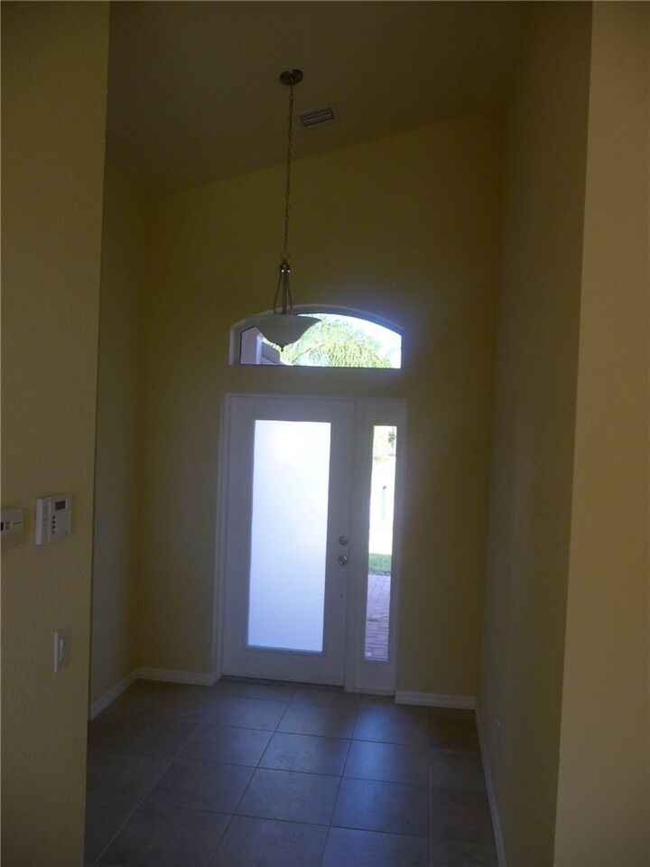 Property Photo: 515 Calamondin Way SW FL 32968