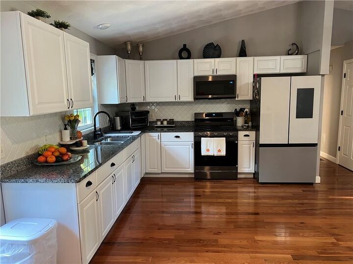 Property Photo:  26 Ophelia Street  RI 02909 
