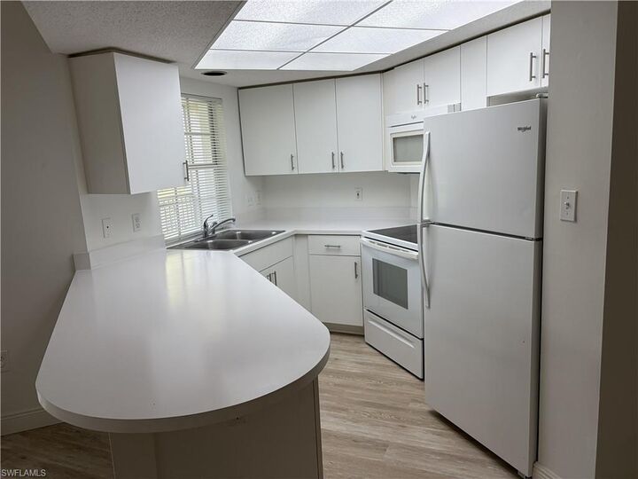 Property Photo:  481 Quail Forest Blvd B207  FL 34105 