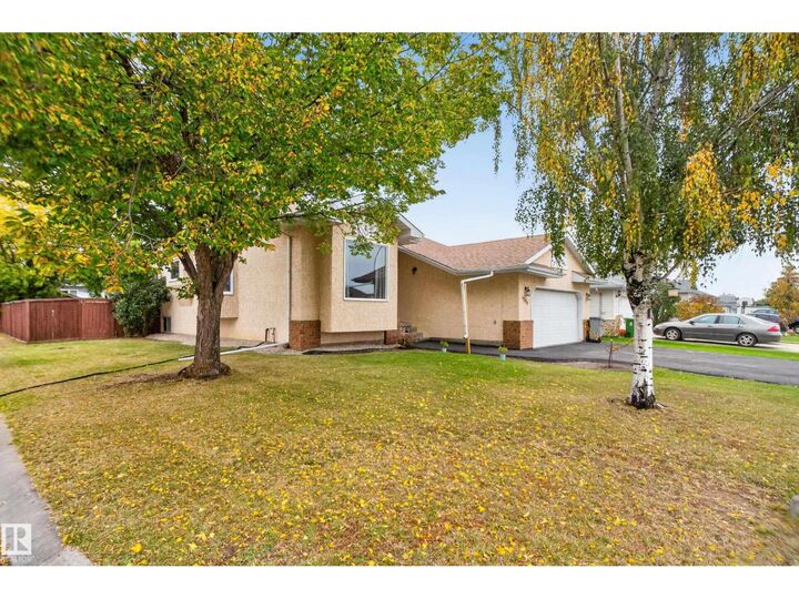 Property Photo:  9504 95 St SE  AB T8R 1K9 