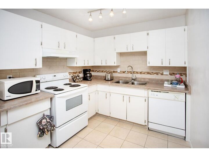 Property Photo:  #407 9810 178 St NW  AB T5T 3H4 