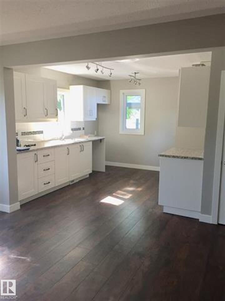 Property Photo:  11922 42 Street NW Upper  AB T5W 2N6 