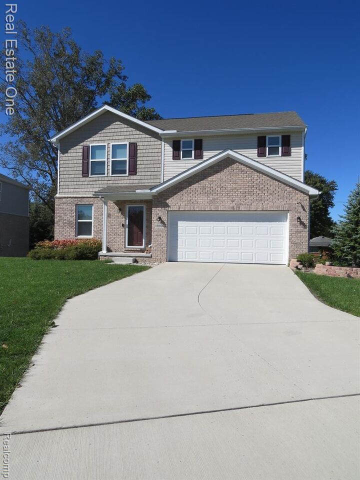 Property Photo:  10884 Island Lake Drive  MI 48180 8233 