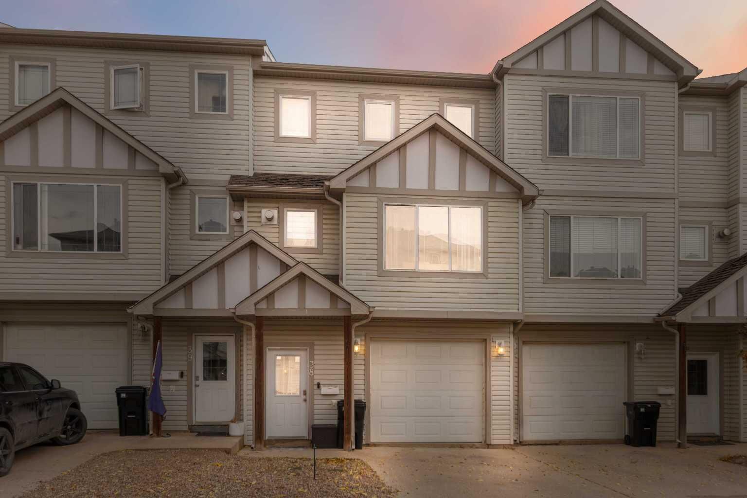 Property Photo: 240 Laffont Way 38 AB T9K 2W2