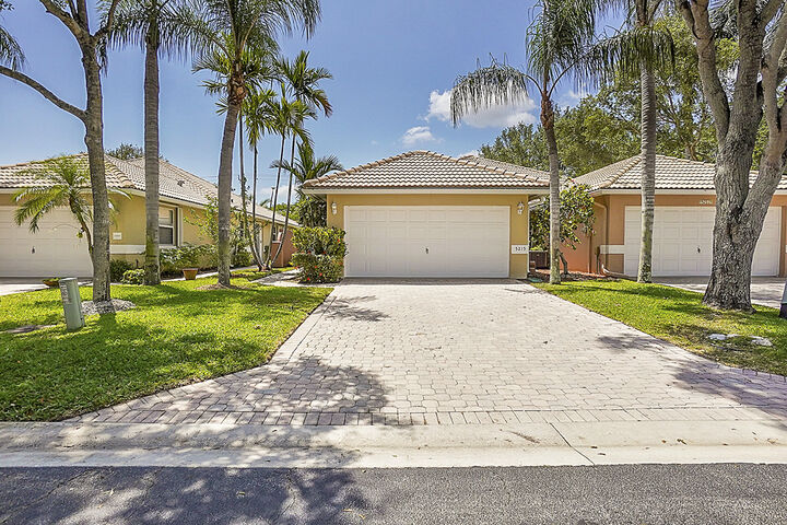 Property Photo:  5215 Grande Palm Circle  FL 33484 