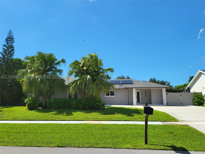 Property Photo: 712 Juniper Pl FL 33414