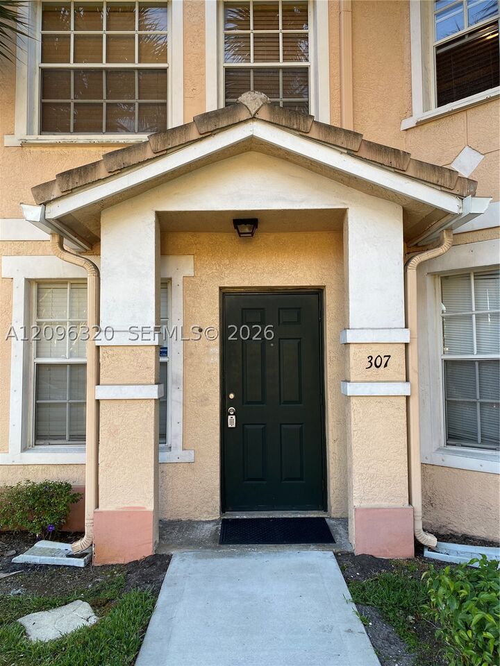 Property Photo:  307 Belmont Ln  FL 33068 