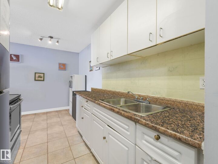 Property Photo:  13230 Fort Road NW 3B  AB T5A 1C2 