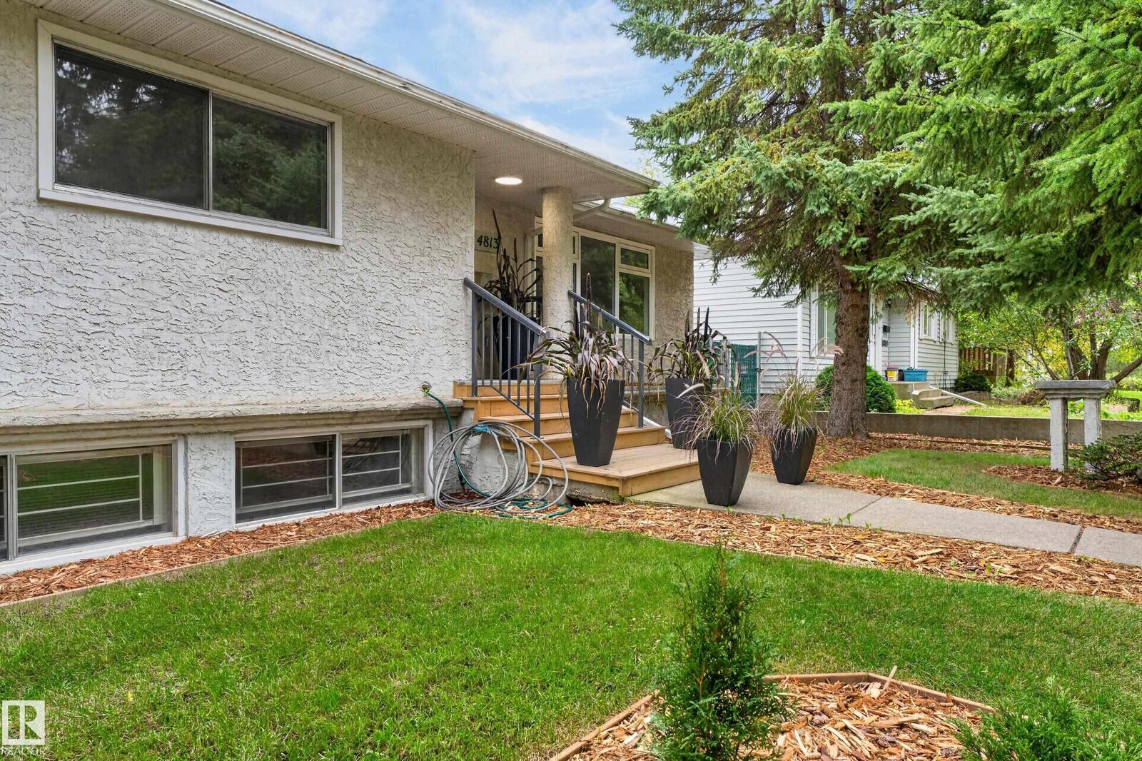 Property Photo:  4813 115 Avenue NW  AB T5W 0W3 