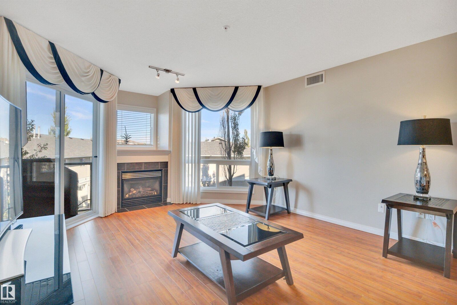 Property Photo:  102B Bridgeport Crossing 210  AB T9E 8K8 