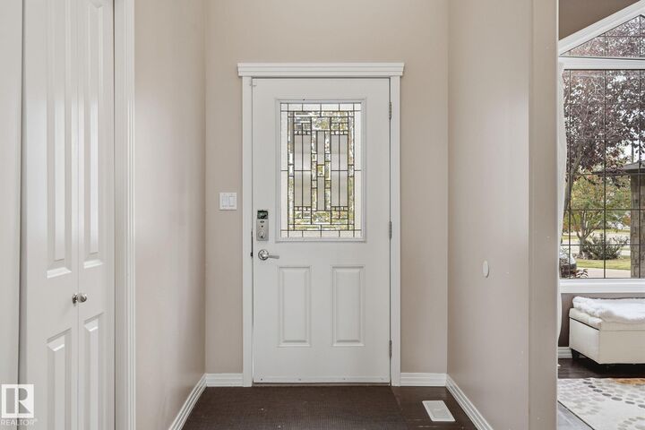Property Photo:  1209 Cunningham Drive SW  AB T6W 0R5 