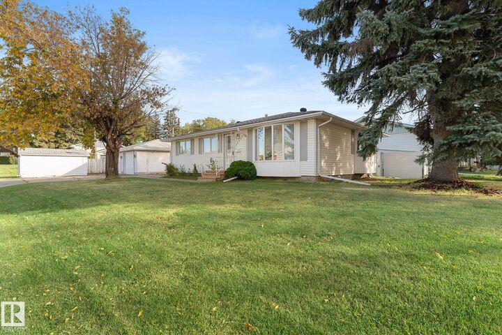 Property Photo:  12227 58 Street NW  AB T5W 3X6 