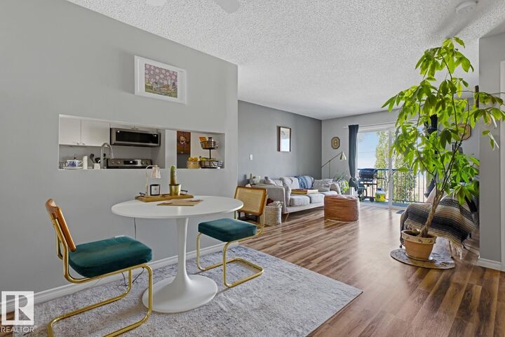Property Photo:  2520 50 Street NW 428  AB T6L 7A8 