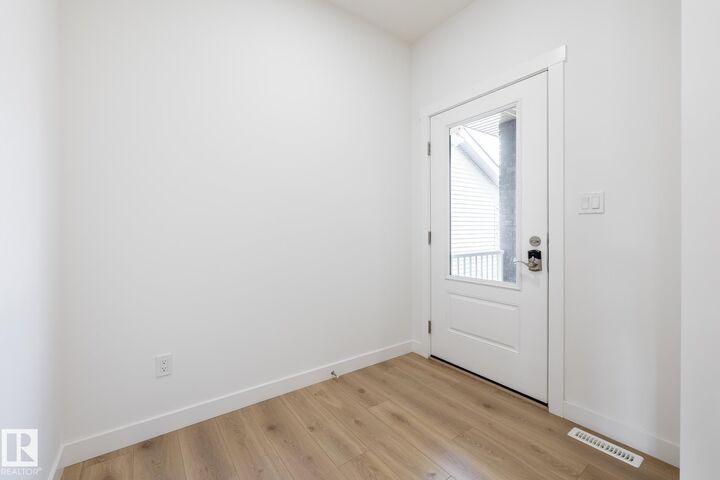 Property Photo:  3036 197 Street NW  AB T6M 3L9 