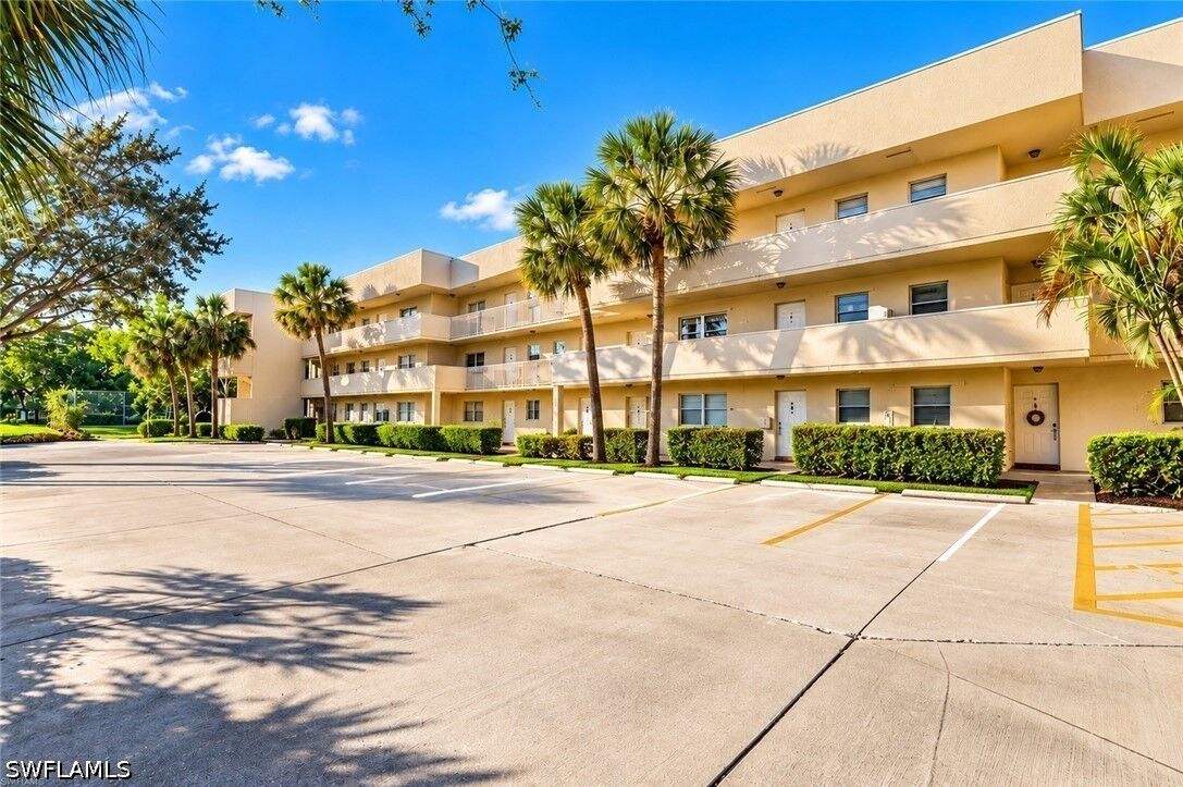 Property Photo:  501 Forest Lakes Boulevard 212  FL 34105 