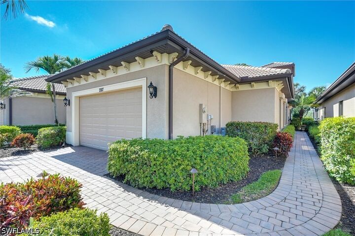 Property Photo: 7587 Moorgate Point Way FL 34113