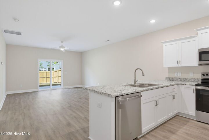 Property Photo:  303 Coastal Reef Court  NC 28445 
