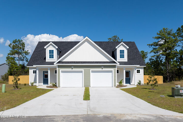 Property Photo:  310 Coastal Reef Court  NC 28445 