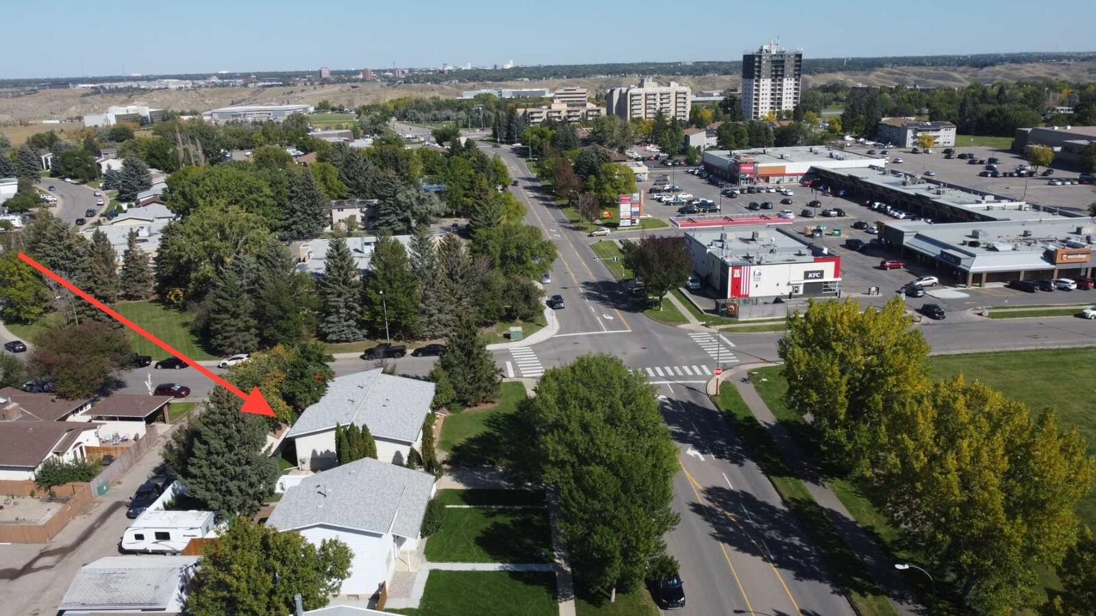 Property Photo:  205 Columbia Boulevard W  AB T1K 3Z5 