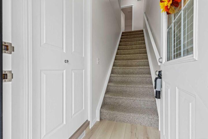 Property Photo: 140 Sagewood Boulevard SW 406 AB T4B 3H5