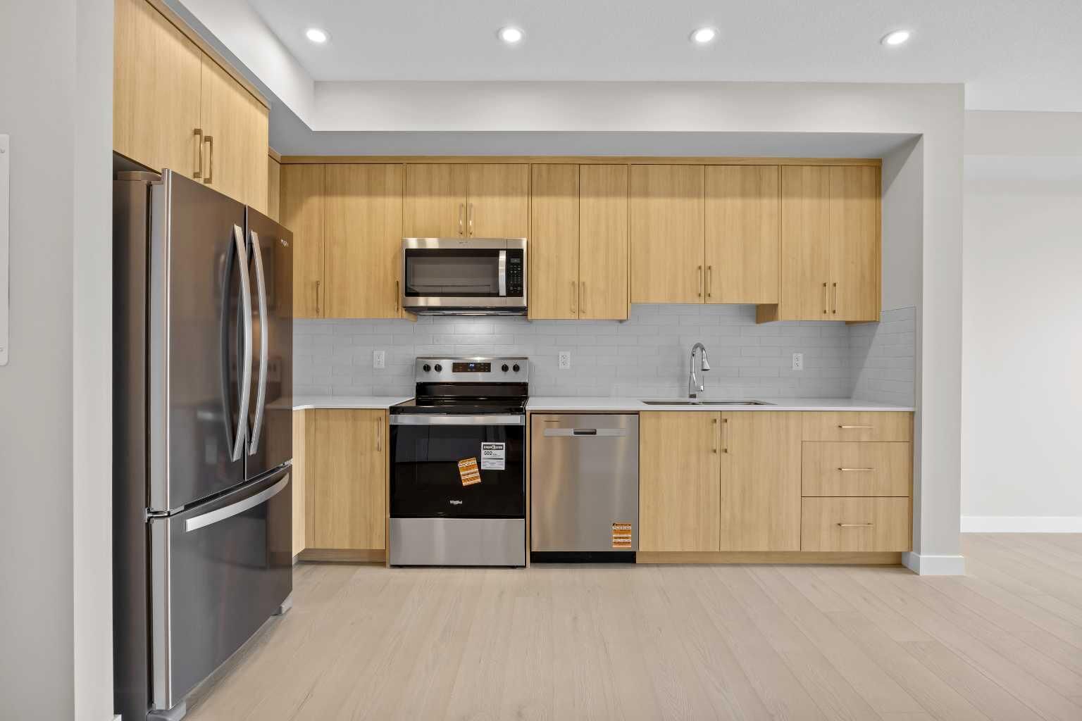 Property Photo: 100 Banister Drive 3306 AB T1S 5Y4