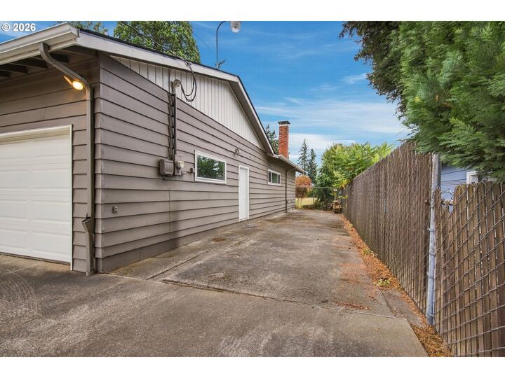 Property Photo:  8123 SE Roots Rd  OR 97267 