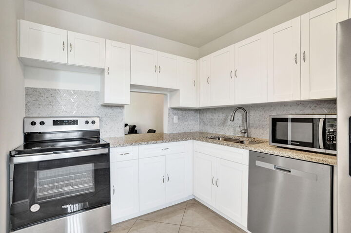 Property Photo: 130 Lake Meryl Drive FL 33411