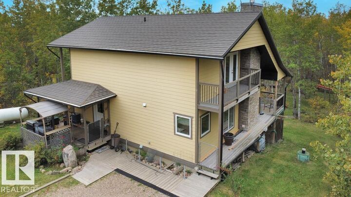 Property Photo:  58532 Rge Rd 113 222 / 220  AB T0A 0C0 