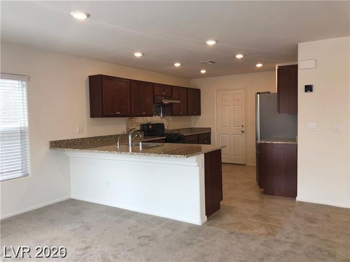 Property Photo:  7576 Slipper Orchid Street  NV 89148 