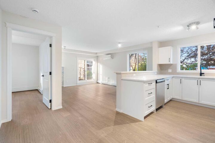 Property Photo:  115 Prestwick Villas SE 1112  AB T2Z 0M8 
