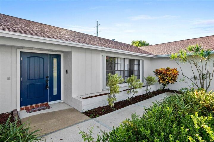 Property Photo:  1941 Shower Tree Way  FL 33414 