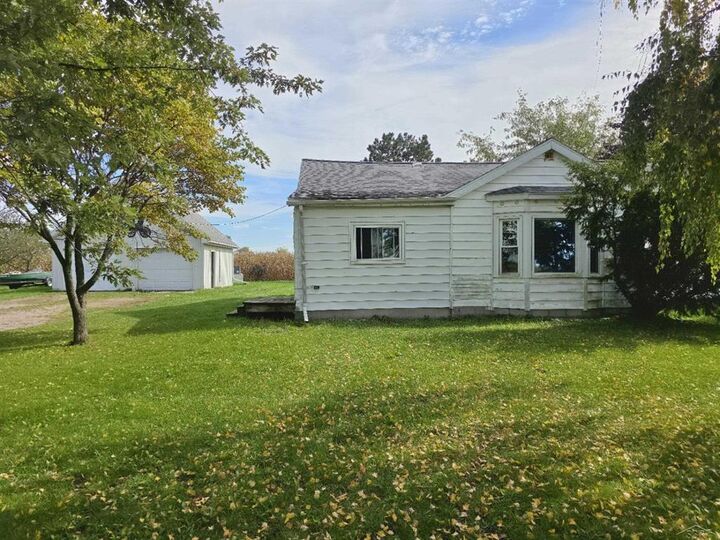 Property Photo:  8775 East Road  MI 48417 